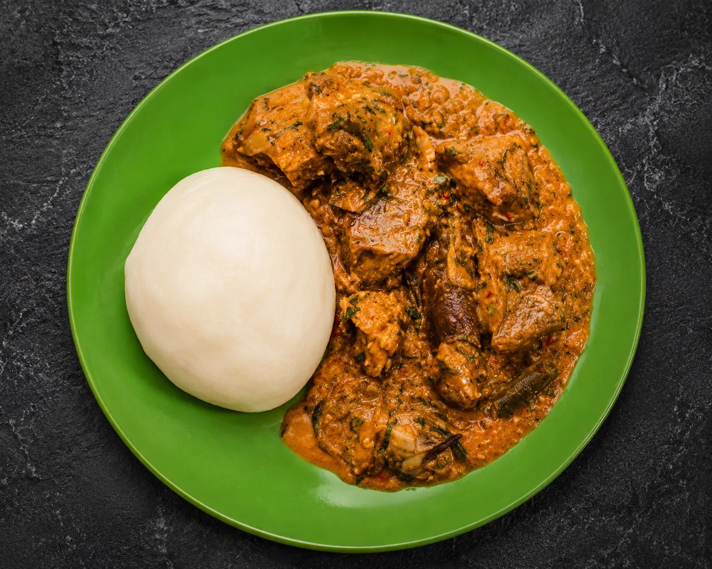Nigerian jollof rice and stews served at Roswen Nigeria Restaurant & African Food Store near Argyle, London, ON